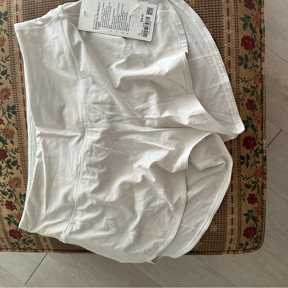 NWT Lululemon high rise tracker shorts- bone